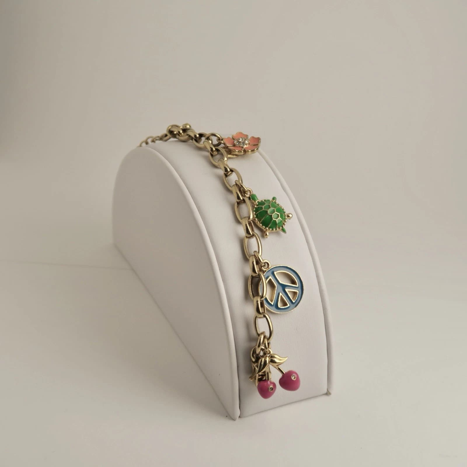 JUICY COUTURE Charm Floral Peace Turtle Gold Tone Vintage Bracelet Jewelry Br145